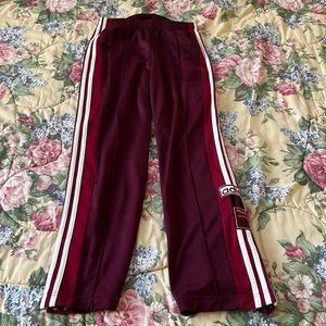Maroon adidas snap sweatpants